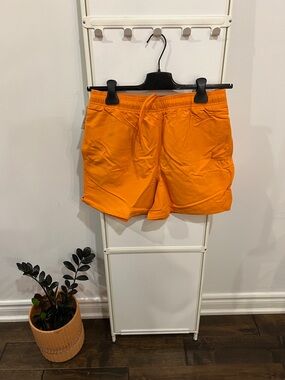 Tna Big Easy 5” Shorts in Burnt Citrus Orange